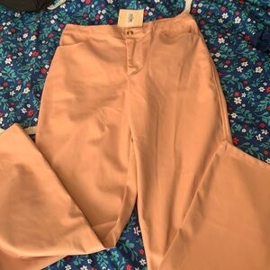 Kittenish faux pink leather pants